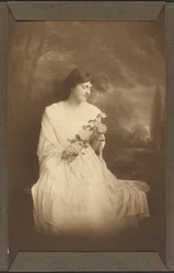 Portrait of a Woman Seated Before a Pastoral Scene with Rose