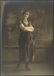 Portrait of a Woman Standing Before Tapestry