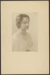 Portrait of a Woman in Dress with Silk Roses