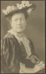 Portrait of a Woman in Hat with Dogwood Flowers