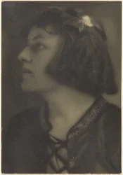 Portrait of a Woman with Butterfly Hair Clip