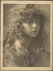 [Portrait of a Woman with Curly Hair]