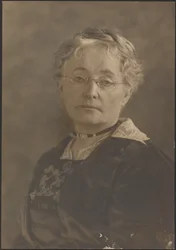 [Portrait of a Woman with Glasses]