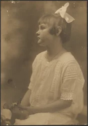 Portrait of a Young Girl with Flowers in Lap