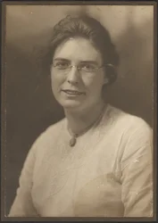 Portrait of a Young Woman in Glasses