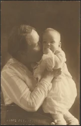 Woman Kissing Baby