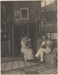[Woman Listening to a Man Playing Guitar]