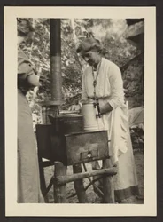 Woman Using Outdoor Stove