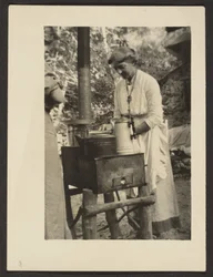 Woman Using Outdoor Stove