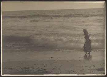 Woman Walking in the Beach Surf