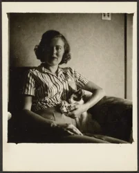 [Woman in Chair with Cat]