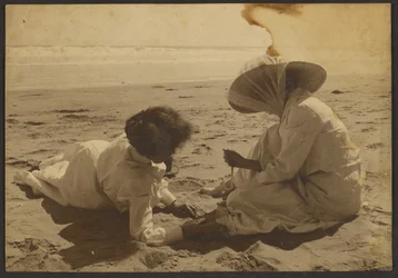 [Women Lounging on the Beach]
