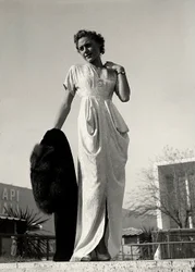 Model in evening dress created by the couture house 