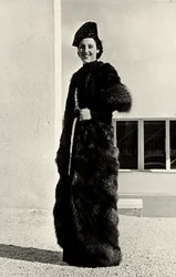 Model wears an overcoat of silver fox created by the Italian couture house Dragoni
