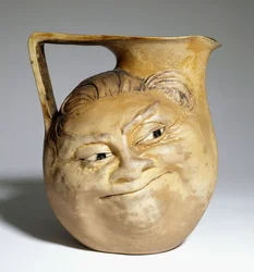 A Martin Brothers grotesque jug with a humorous face, 1898