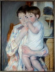 Woman and child in front of a table with jam and a bowl