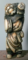 Japanese Netsuke of a Chinese dancer and child, 18th century