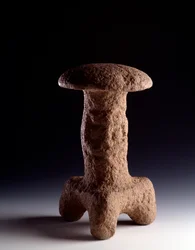 Stone sculpture in the form of a tripod fungus
