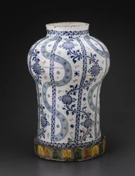 Jar with Vertical Flowing Bands and Vines with Sunflowerlike Blossoms