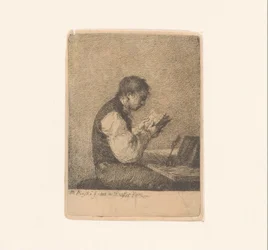 Man Reading at a Desk