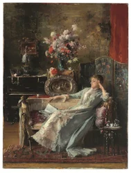 Young Woman Sitting on a Sofa