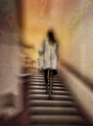 Woman Climbing Blurry Stairs