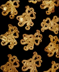 Small gold octopus brooches from tomb III, Mycenae (16th century BC)