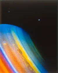 Saturn and its moon Dione, seen from the Voyager 2 spacecraft