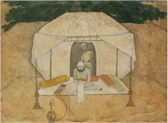 Balwant Singh Seated Writing on a Camp-Bed