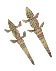 Carved wooden crocodile figures decorated with red, green and black painted geometric patterns, Hausa People, Kano, Northern Nigeria