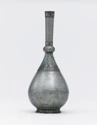 An Ottoman turquoise inset silver mounted zinc bottle