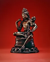 Padmapani Lokeshvara seated in meditation, first half of the 7th century (bronze inlaid with silver & copper)