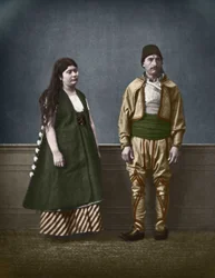 Portrait of a Bulgarian woman from Sofia and a Bulgarian man around 1890. Colorized photography by Pascal Sebah (1838-1890).