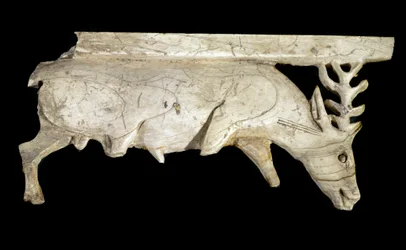 Civilization of the Phoenicians: ornament of a royal ivory bed in the shape of a deer, from the site of Arslan Tash (Syria). 9th century BC. Paris, Musee du Louvre