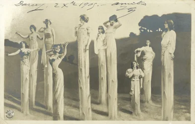 Women on stilts dressed as asparagus