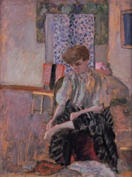 Woman putting on her stockings