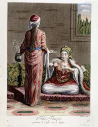 Turkish girl taking coffee on the sopha, “Collection of 100 prints representing different nations of the Levant in 1707 and 1708” by orders of M. de Frriol, ambassador of the king at the Porte and updated in 1712-13 by the care of M. Le Hay, Basan