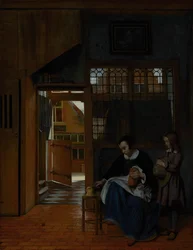 A Woman Preparing Bread and Butter for a Boy