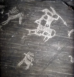 Camunni civilization, Prehistory, rock art: grave rock, representing hunters and deer. Rocher de Naquane, in Valcamonica (Val Camonica)
