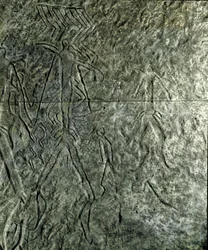 Petroglyph (graffiti on stone) of human figures. Neolithic, Stone Age. Bronze age. Azerbaijan State Religion History Museum, Baku