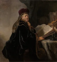 A Scholar Seated at a Desk