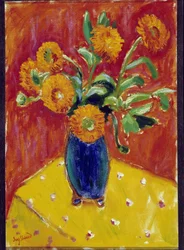 Bouquet of peonies in a blue vase