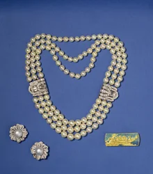 Selection of pearl jewellery: three-row pearl necklace with diamond clips; bouton shaped Southsea cultured pearl earrings; gold and enamel brooch by Lalique, c.1900