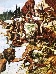 Pre-historic men attacking mammoths