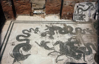 Ancient Ostia. Place des Corporations. Mosaic of the Sabratha Seafarers Corporation. Baths of Neptune