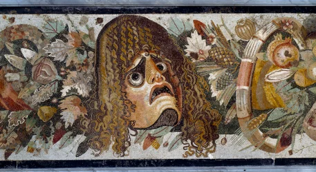 Festoon with mask, leaves and fruit (detail). Mosaic from Casa del Fauno in Pompei, 2nd century BC. Museo Nazionale Archeologico, Naples