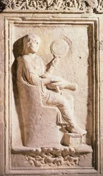 Relief depicting Roman lady with mirror