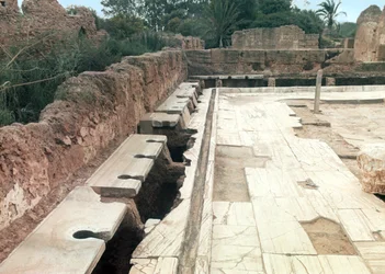 View of a communal lavatory, possibly part of the Hadrianic Bath complex, c.127 AD