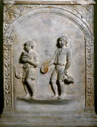 Roman art: funerary altar depicting two servants carrying objects for a sacrifice. Low relief. Rome, Museo Nazionale Romano