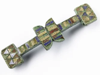 Strap junction with upper surface set with red, blue and yellow enamel, from the Roman legionary fortress at Inchtuthil, Caputh, Perthshire